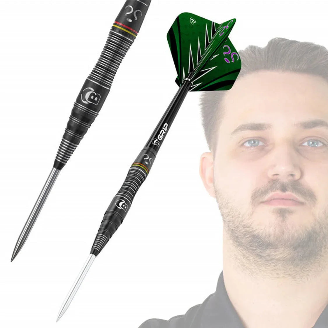 Angled full view of 90% tungsten darts highlighting black ringed grip and green flights, player portrait faintly in background