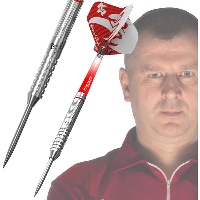 Angled view of 90% tungsten darts showing ringed barrel grip and red flights, displayed next to professional dart player's face