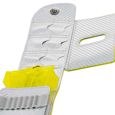 Angled close-up of open darts case showing storage slots, compartments, and yellow dart holder insert for organized dart equipment