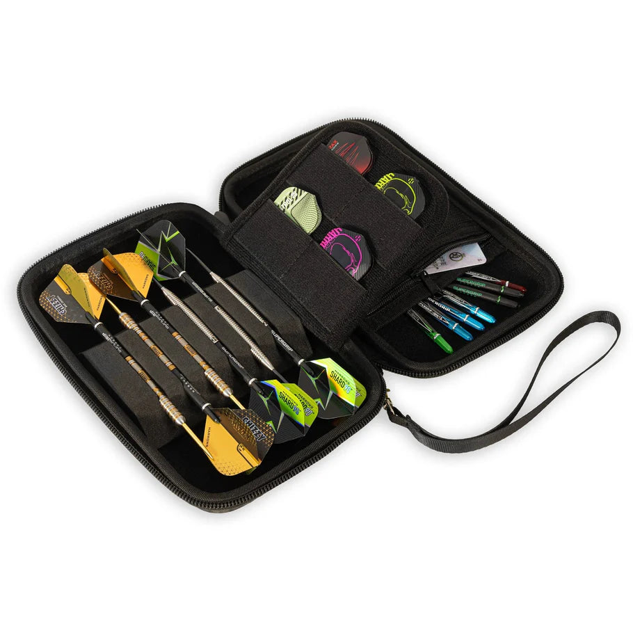 Open dart case top-down showing six steel tip darts, assorted flights, and shafts organized in foam and mesh compartments