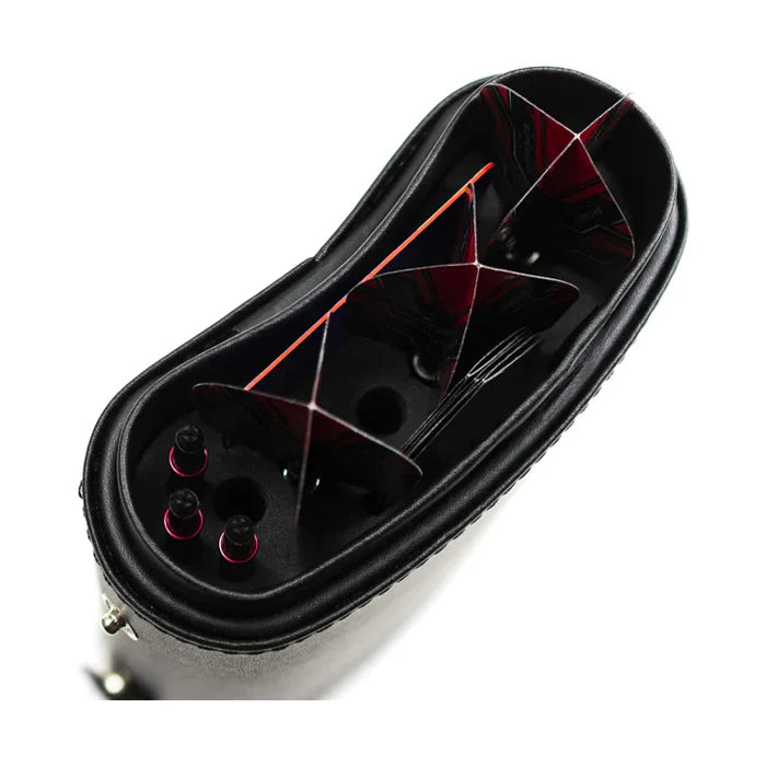 Top-down view of dart case interior with divided compartments for flights, shafts, spare tips, and dart accessories