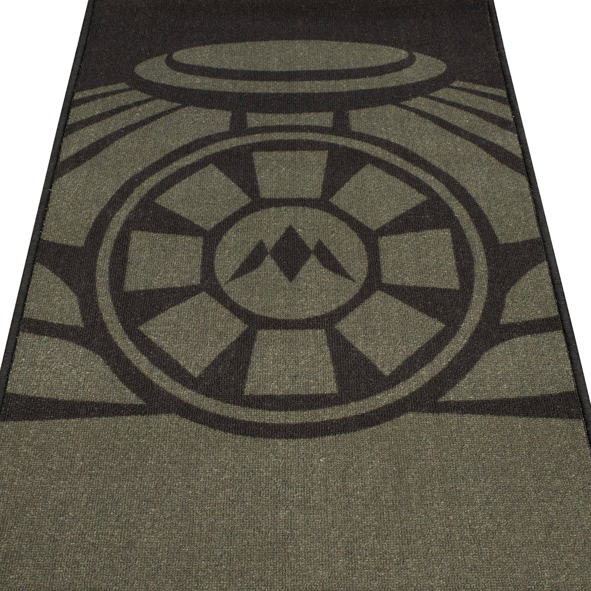 Angled close-up of dart mat central target design, showing textured surface and non-slip backing for darts setup