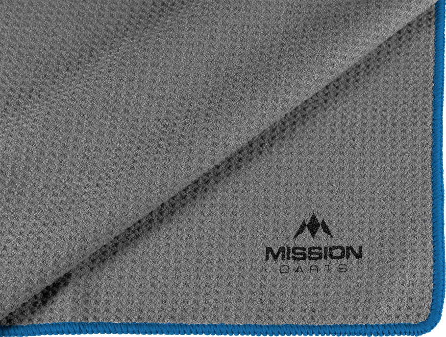 Close-up angled view of grey waffle hand towel with textured pattern and blue edging for dart players