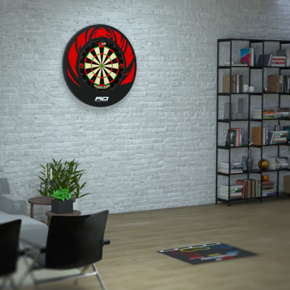 Dartboard with bold red and black design mounted on wall in modern living room, showing home setup for darts aiming and play