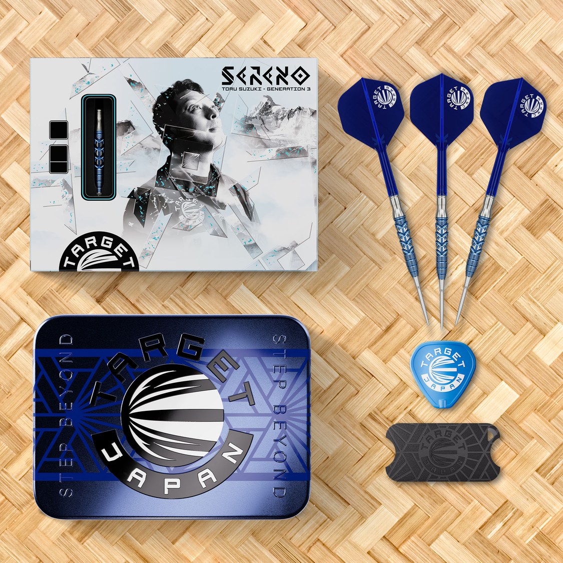 Target Japan Sereno G3 darts with blue K-Flex flights, storage tin and packaging on a woven mat