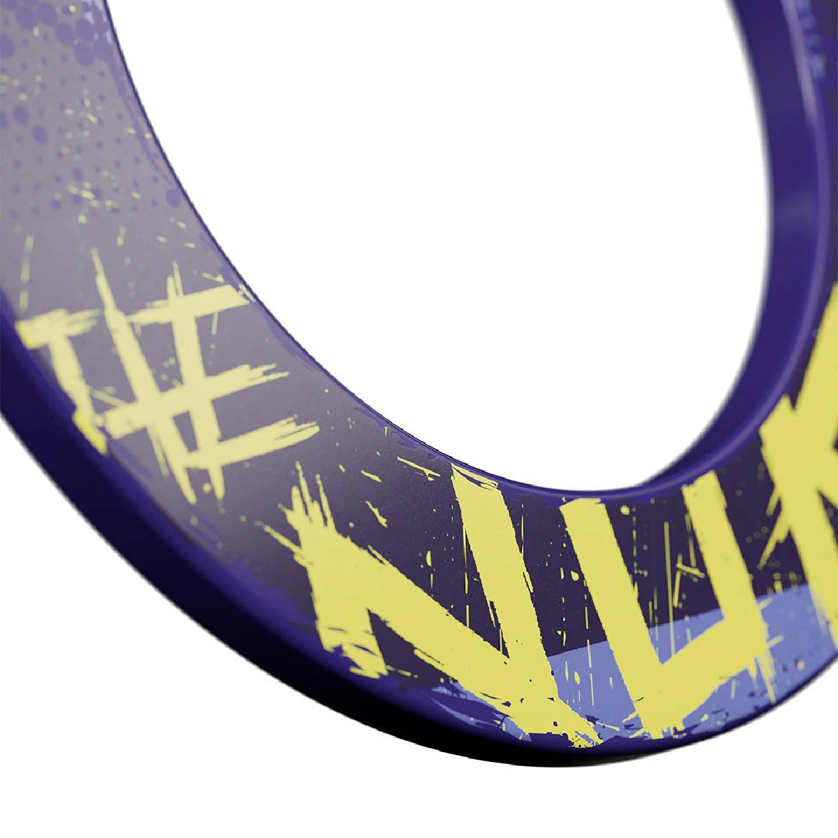Close-up of Luke Littler dartboard surround showing bold yellow lettering and purple design detail for dartboard protection