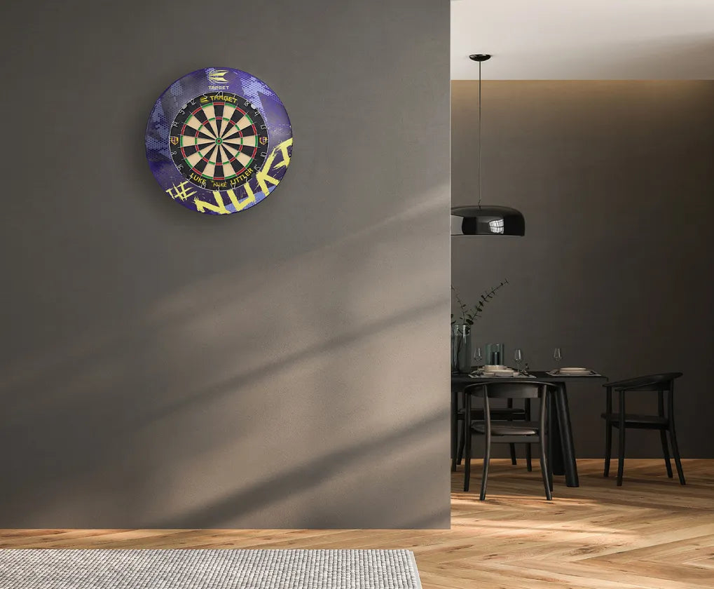 Luke Littler dartboard surround in purple and yellow mounted on wall in modern dining room, lifestyle display for home dart setup