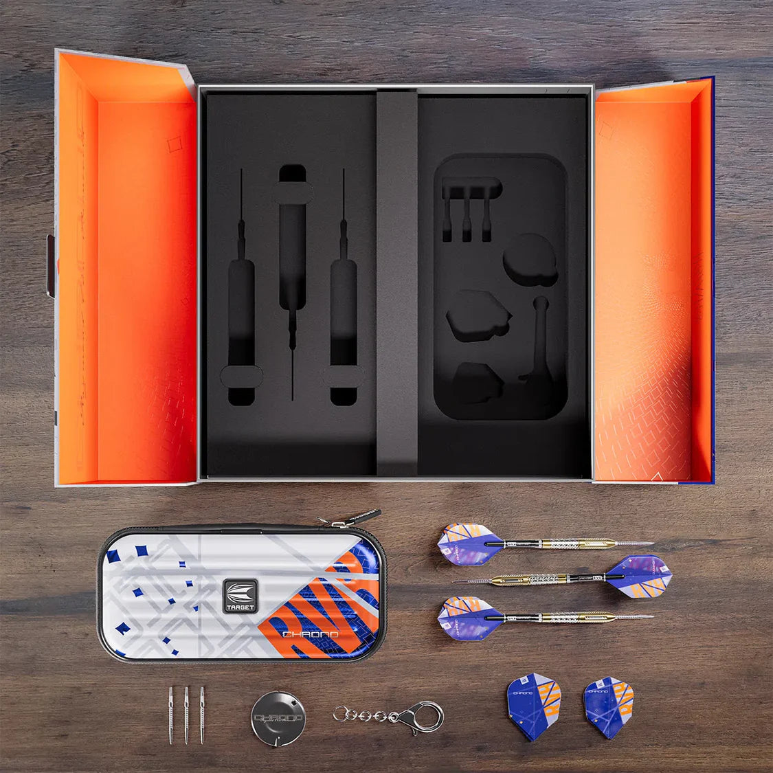 Top-down shot of Raymond Van Barneveld 95% tungsten darts set with darts, flights, case, and accessories arranged beside open box
