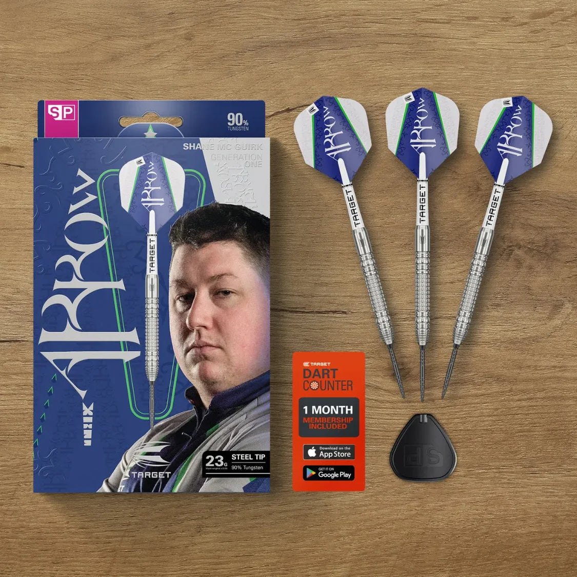 Top-down shot of 90% tungsten steel-tip darts with blue flights, signature packaging, dart counter card, and accessories on wood