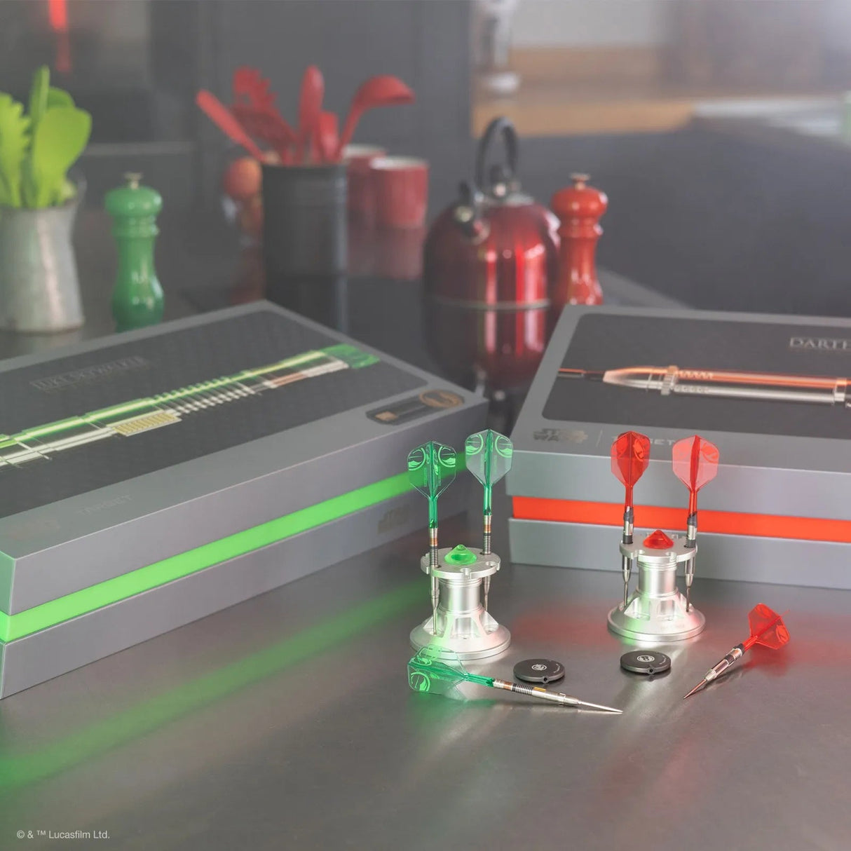 Luke Skywalker tungsten darts set displayed on stands with green and red flights, collectible boxes, and dart accessories in a kitchen scene