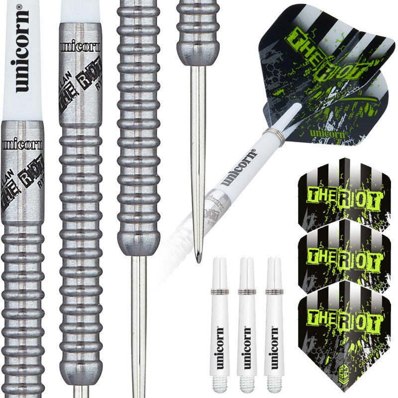 Close-up of 90% tungsten darts showing precision ring grip barrels, full assembled dart with 'THE RIOT' flights, plus extra shafts and flights
