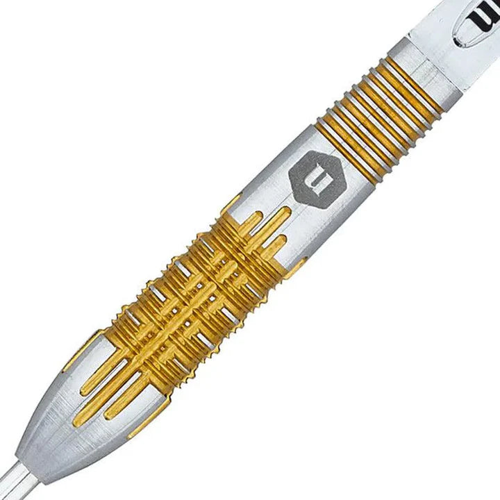 Close-up of tungsten dart barrel with detailed gold grip grooves and engraved logo, isolated on white background