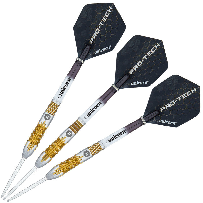 Set of three 90% tungsten darts arranged diagonally, gold and silver barrel grip detail, hex pattern flights on white background