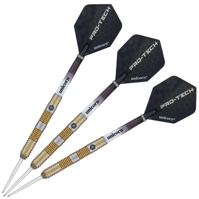 Set of three 90% tungsten darts with gold ringed barrels, knurled grip, and black Pro-Tech flights, isolated on white background