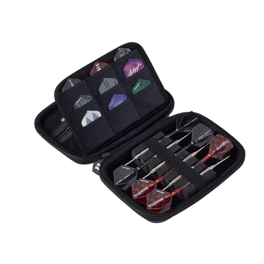Angled view of black darts case open to show six assembled darts and organized flight pockets, isolated on white background