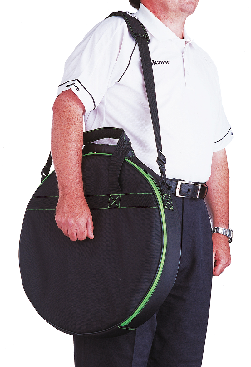 Portable dartboard set in round carrying case with shoulder strap, shown in use for easy transport and size reference