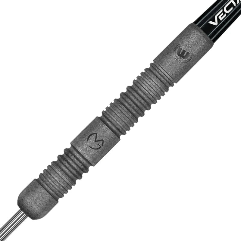 Close-up of MVG Exact dart barrel showing detailed grip texture and engraved logos for optimal dart control