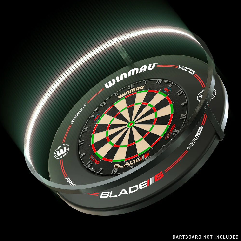 angled product view of dartboard surround ring with bold branding, displayed around dartboard for scale, lighting effect on black background