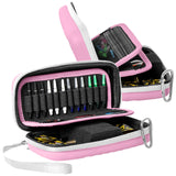 Angled view of open pink small darts case displaying organized dart shafts, flights, and secure interior storage compartments
