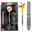 Darts with gray shafts and colorful flights next to their packaging featuring a man's face.