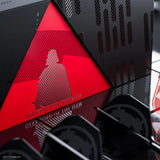 Close-up of a red and black gaming mouse pad with a logo and text.