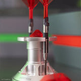 Close-up of a dart in a stand with a blurred background