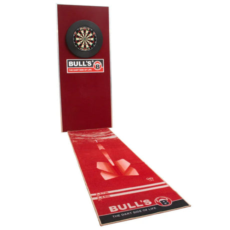 Angled view of red dart mat fully extended under wall-mounted dartboard, showing throw lines and soft pile surface for dart play