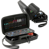 Angled view of open XL black darts cases with organized dart shafts, flights, and accessories in foam and mesh compartments