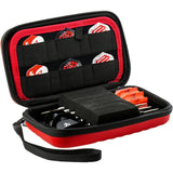 Angled close-up of open red darts case showing organized dart storage, foam slots for assembled darts, flight pockets, and accessory compartments