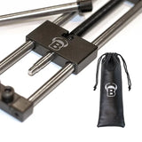 Close-up angled view of dart point repointer tool showing tip clamp and included storage pouch for steel tip dart maintenance