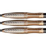 Close-up of three Bronzo Flux tungsten darts with bronze barrels, detailed grip rings and silver engraved accents, isolated on white