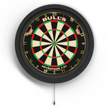 Top-down view of dartboard with circular LED lighting surround system and power cord, isolated on white for darts setup