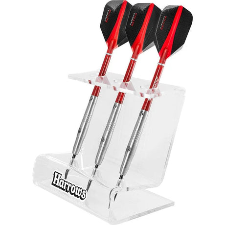 Angled view of clear acrylic 3 dart display stand holding three assembled darts upright, showcasing barrel grip and flight design on white background