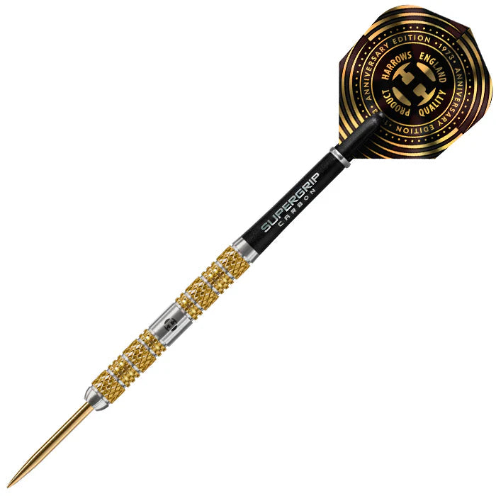 Anniversary tungsten dart full view on white, gold knurled grip, sharp steel tip, black Supergrip Carbon shaft, gold-black flight