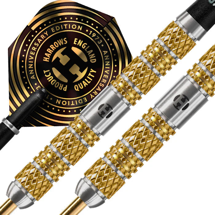 Close-up of 95% tungsten darts with gold knurled grip, barrel engraving, and anniversary flight, highlighting dart barrel texture.