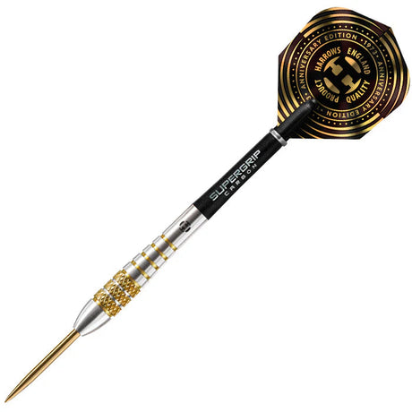 Anniversary Boxer Bomb 90% tungsten dart angled view, gold knurled barrel, Supergrip carbon shaft, black gold commemorative flight