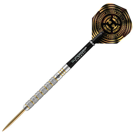 Tungsten dart with precision knurled grip, gold tip, Supergrip carbon shaft, and anniversary edition flight on white background