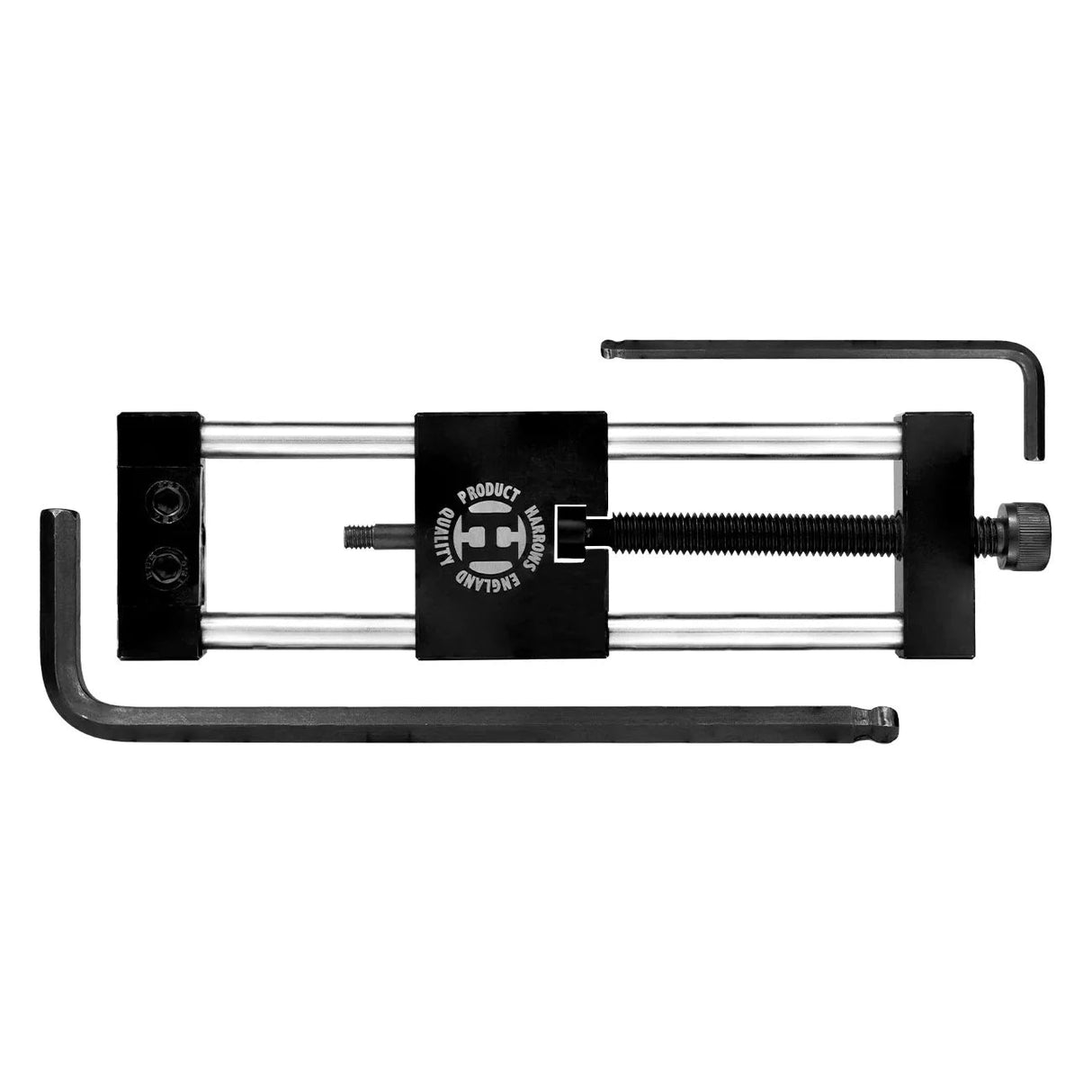 Top-down view of dart repointing tool with hex keys, isolated on white, for replacing steel tip dart points