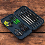 Open darts case top-down view with six darts, spare shafts, flights, and organized dart accessories for secure dart storage