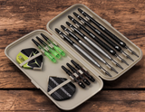 Open darts case top-down view with six assembled darts, spare shafts, and flights organized for dart storage and accessory protection