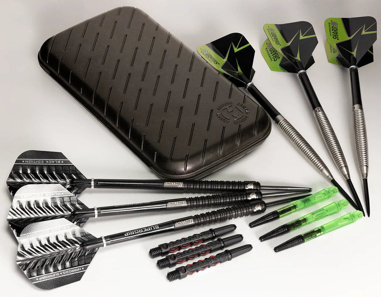 Slim darts case with two sets of assembled darts, spare stems, and flights displayed top-down for dart storage and accessory details