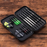Top-down view of open slim darts case showing six darts, spare shafts, and flights organized for dart storage and transport