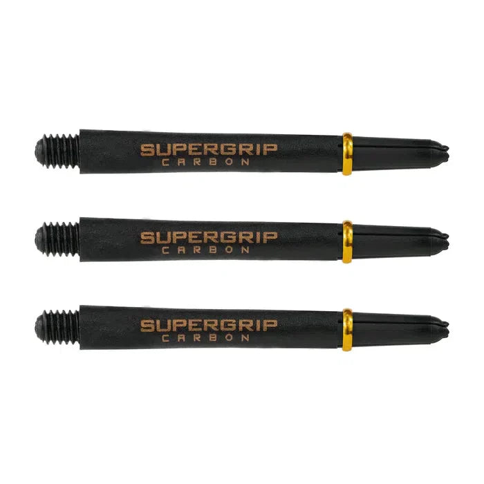 Three black Supergrip Carbon dart shafts with gold rings arranged horizontally on white background, carbon fiber texture visible
