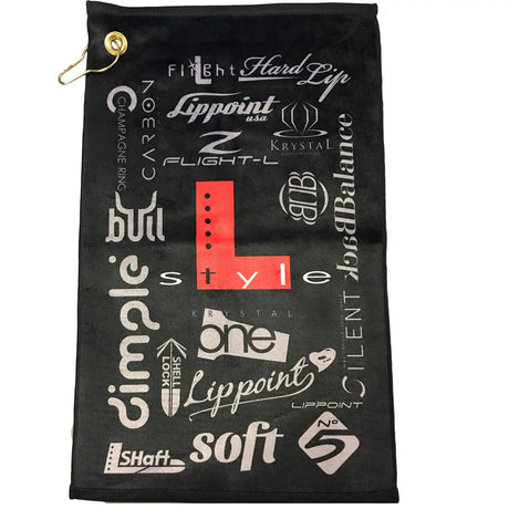 Black microfibre hand towel for darts with multiple white logos, metal grommet, and hanging clip, displayed flat on white background