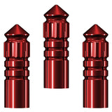 Set of three red aluminium dart flight protectors with precision grooves, full product view on white background