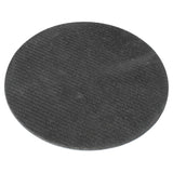 close-up angled view of single round dartboard coaster with textured black surface for darts accessories