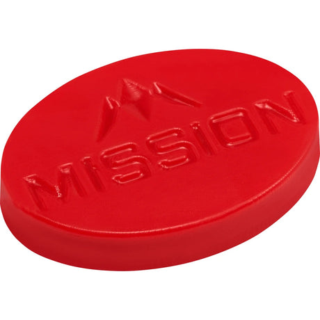Close-up of red grip wax for darts, angled to show embossed texture, isolated on white for enhanced finger grip