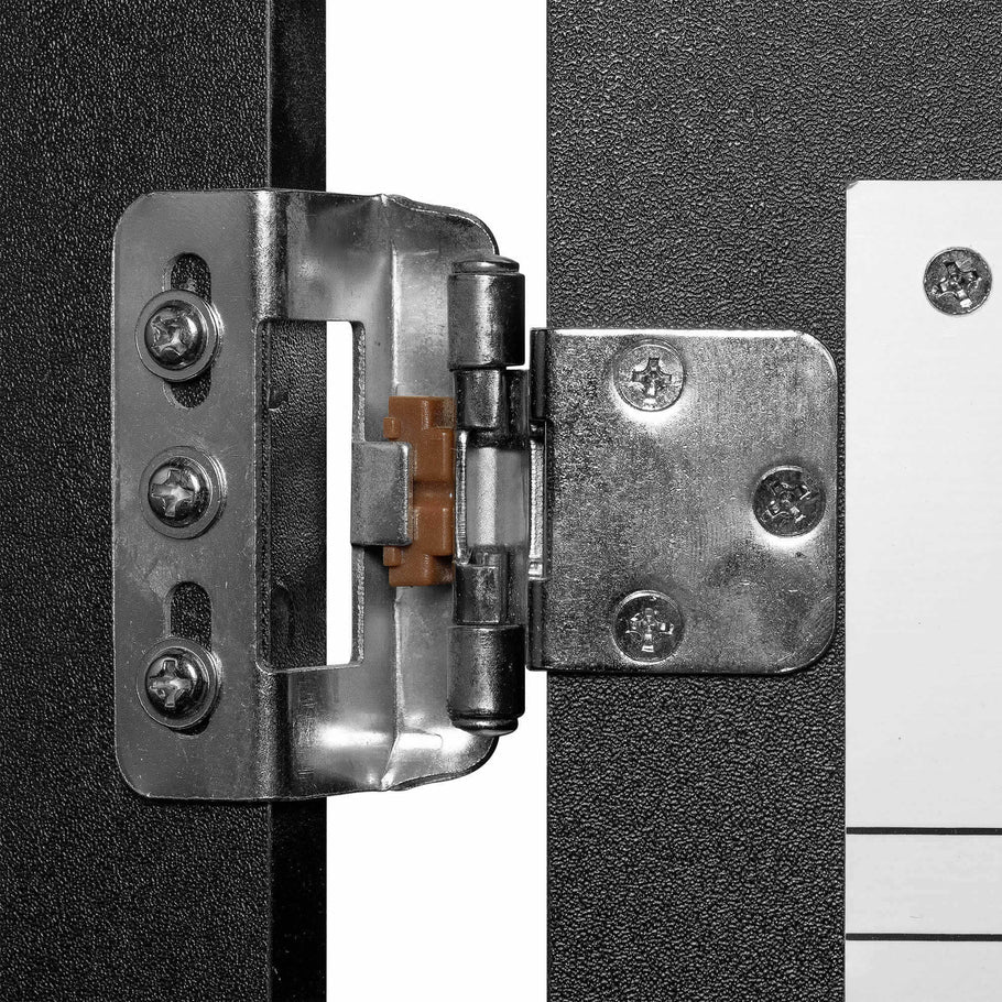 Close-up of dartboard cabinet hinge showing reinforced metal corner, strong screws, and textured black finish