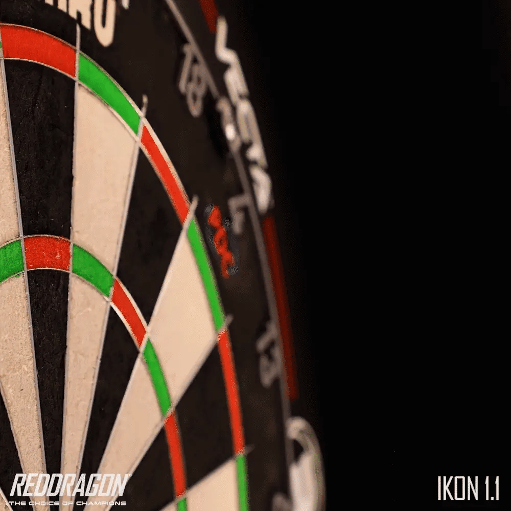 angled view of dartboard with clear red, green, and black scoring zones for tungsten darts play