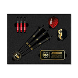 Top-down view of Jonny Clayton 50 Year Limited Edition tungsten darts set in packaging with three assembled darts, extra shafts, flights, and gold accents